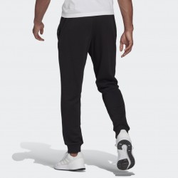 ADIDAS ΠΑΝΤΕΛΟΝΙ ΦΟΡΜΑΣ ΑΝΔΡΙΚΟ ESSENTIALS FRENCH TERRY TAPERED CUFF PANTS μαύρο